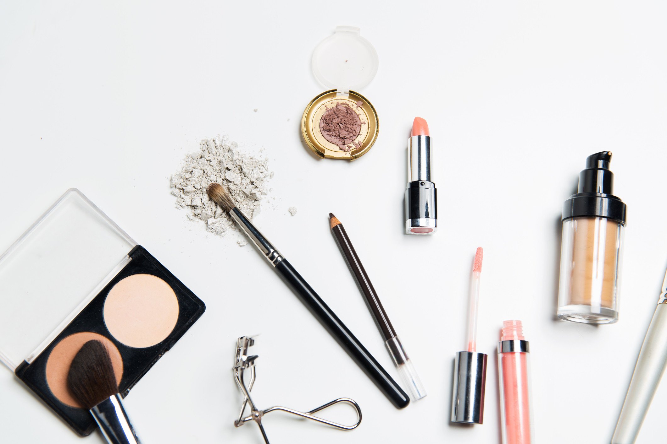 An Image of various make-up products on a white background.