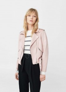 An image of a model wearing a pink jacket.
