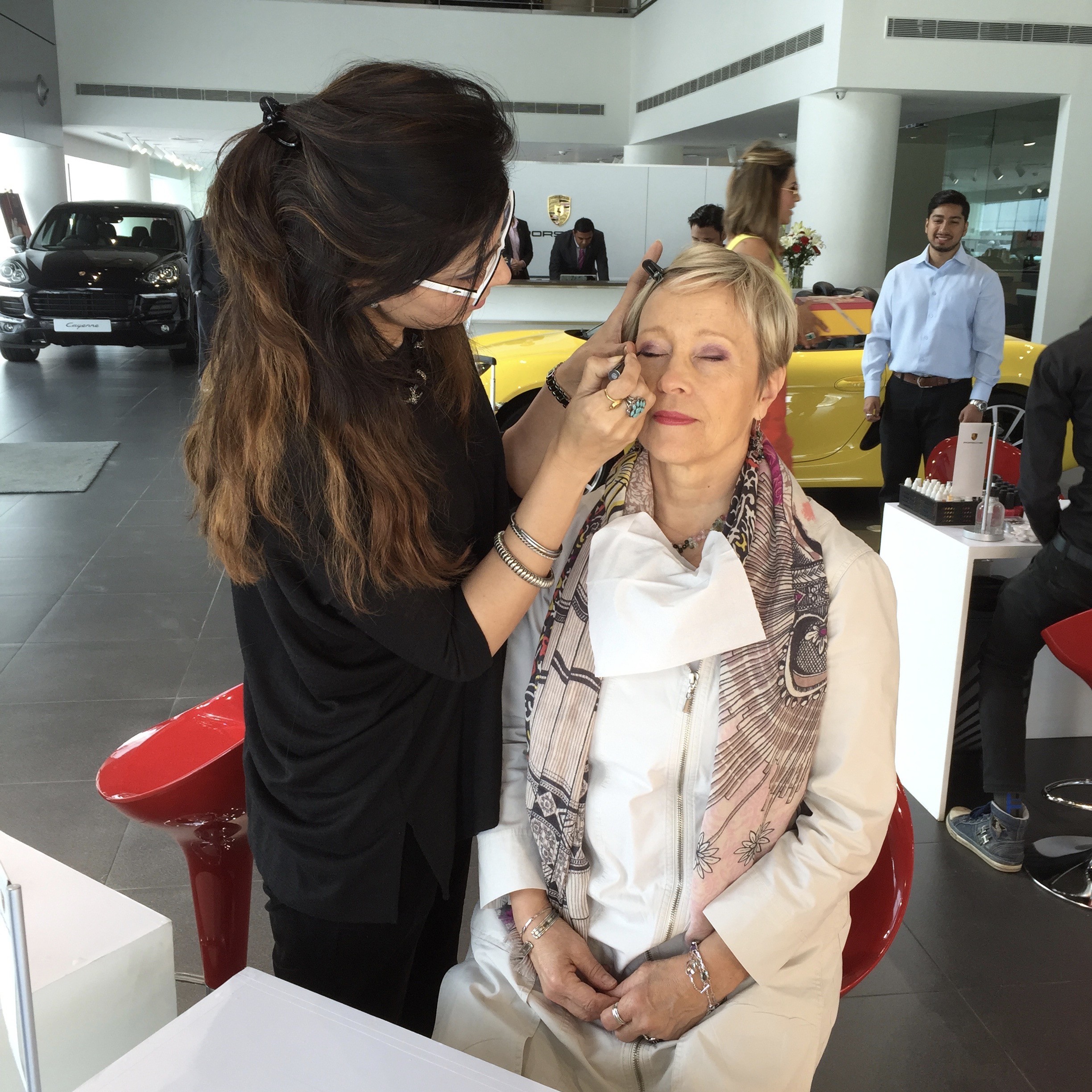 image of Ulla having her makeup done in a showroom for an age amazing profile on her ageing experiences