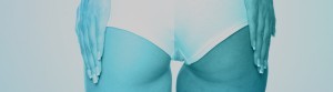 image of a woman's bum in a blue wash for a banner on buttock augmentation