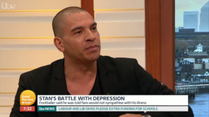 An image of Stan Collymore on Good Morning Britain debating about mental health