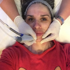 An image of midster, Adele Mitchell getting a hydrafacial treatment