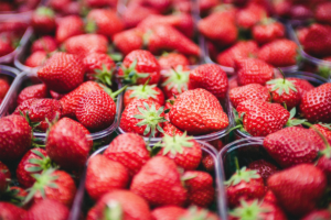 A close up image of punnets of strawberries.