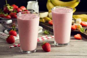 An image of two strawberry fruit smoothies