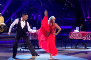 An image of Debbie McGee kicking her leg up in the air on BBC's Strictly Come Dancing 2017.