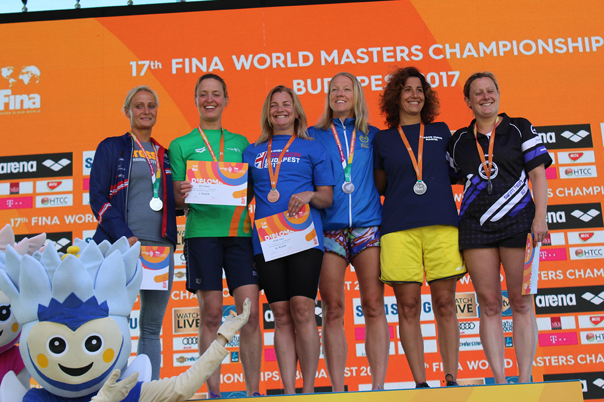 An image of Lucy Ryan at the award ceremony of the World Masters Championships.