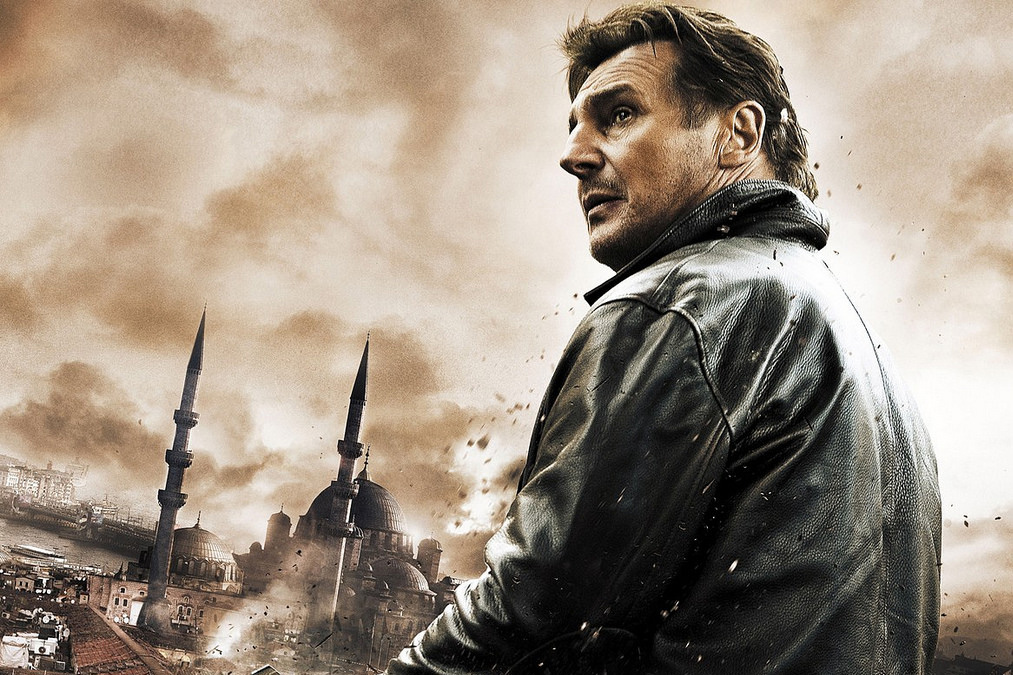 liam neeson against a CGI backdrop of a city crumbling