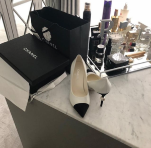 chanel heels freshly out of the box on a marble work top