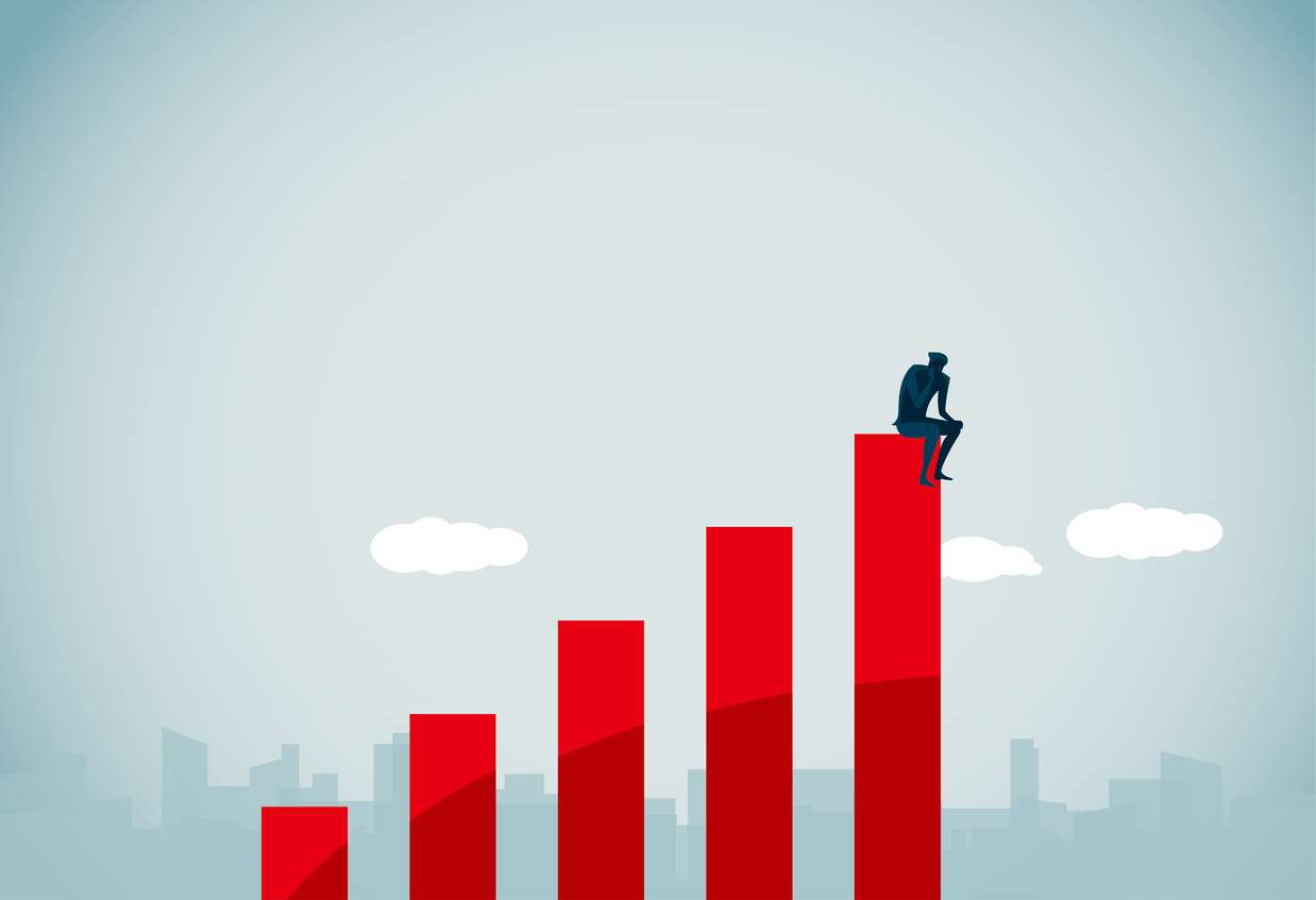 illustration of a graph moving upwards and a man sat in a suit at the top of the graph looking sad