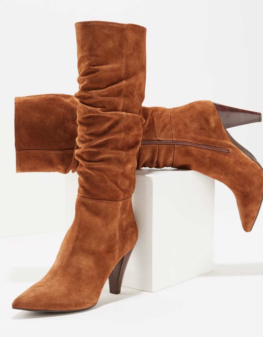 chestnut coloured high knee heeled boots