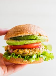 chickpea vegan burger with avocado and tomato