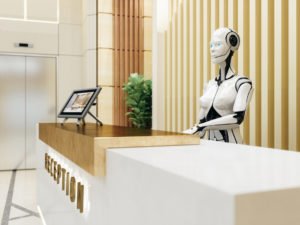 human looking robot stood at reception of a hotel