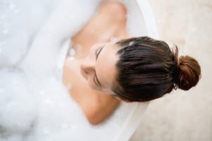 beautiful woman taking a relaxing bath