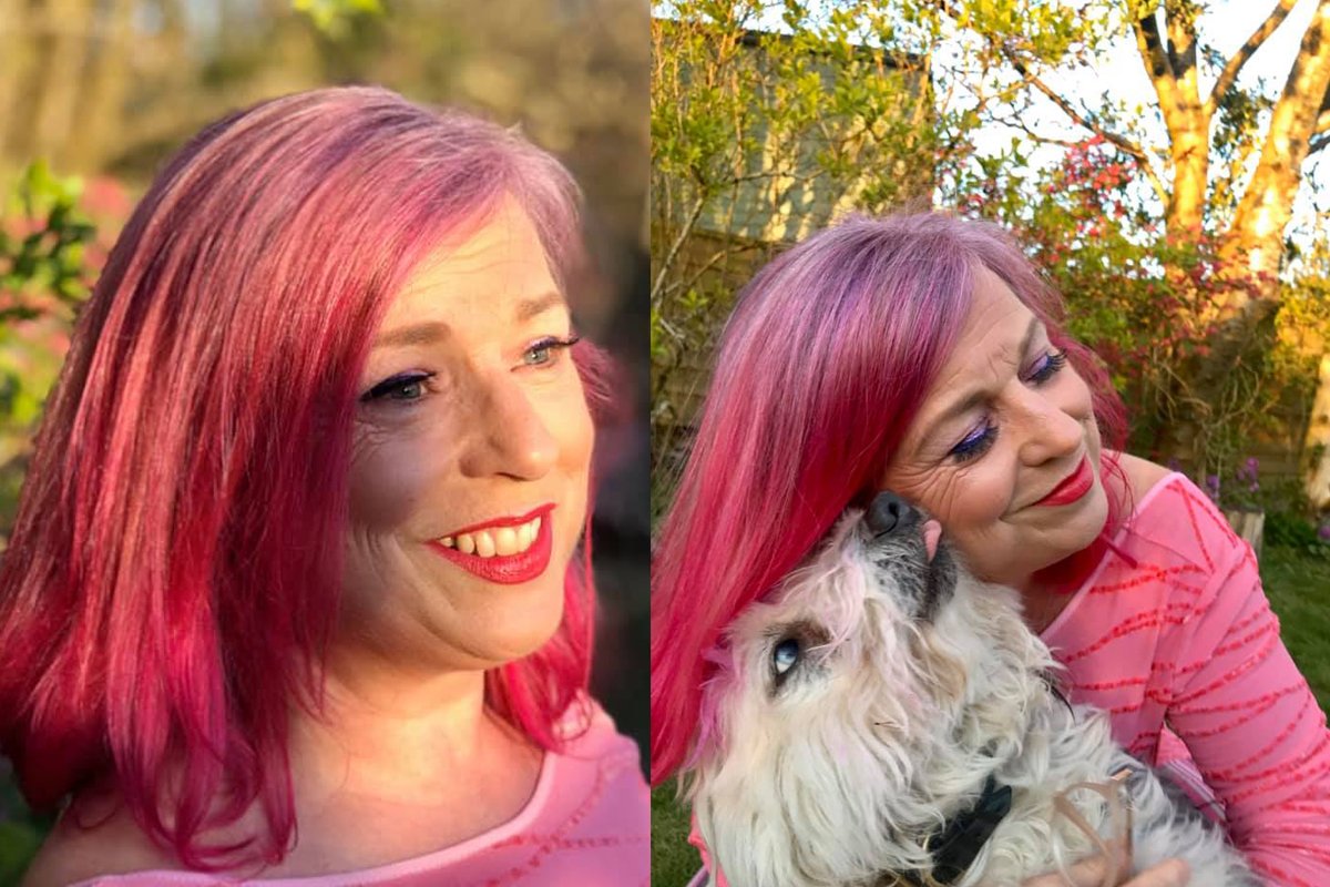 middle aged woman with pink hair positivity during the pandemic